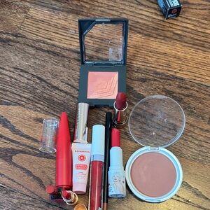 Red Lipstick Lover bundle plus extras. Brands are NARS , charlotte